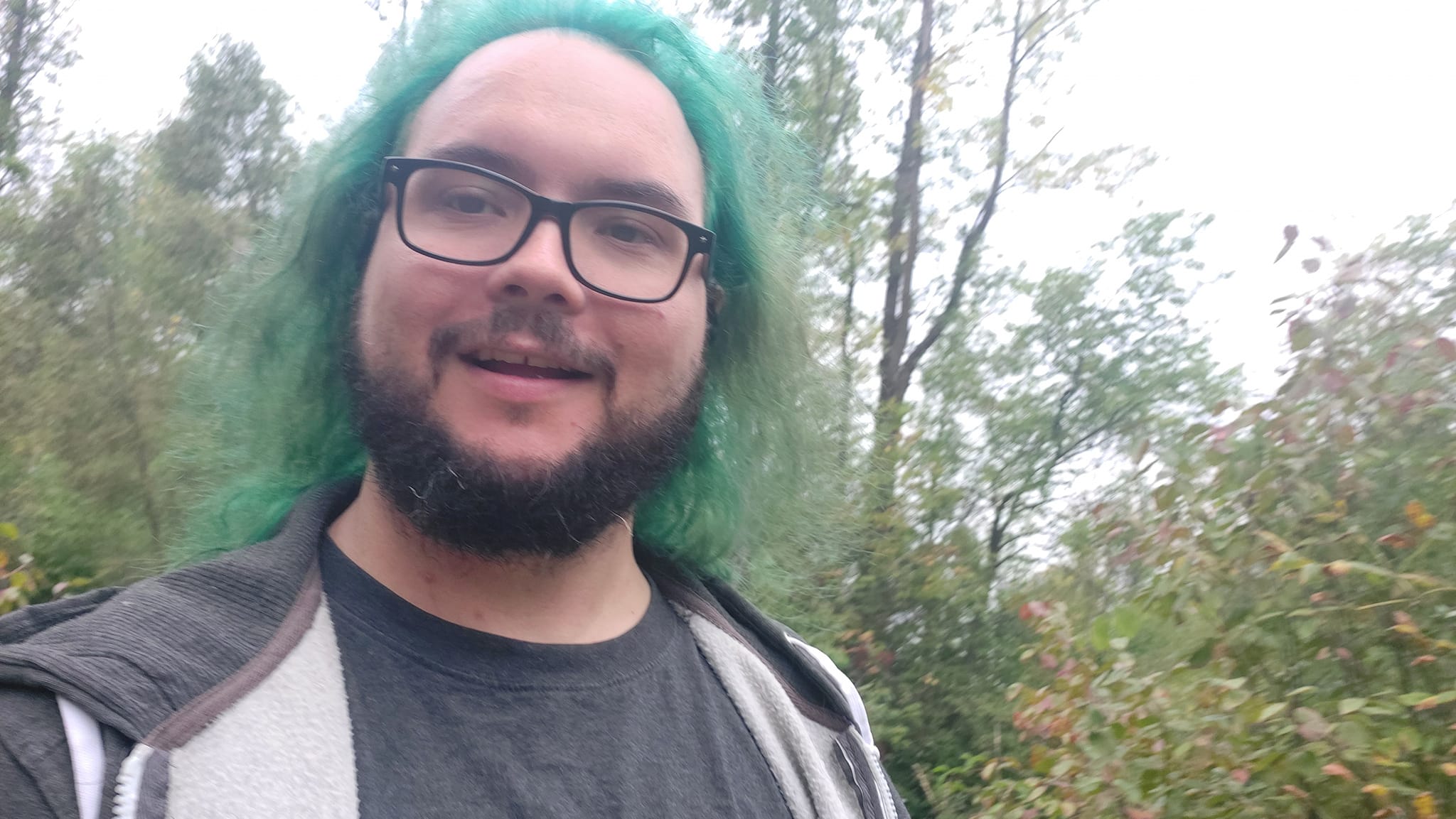 A man with green hair is visiting a freshwater marsh, photo 21